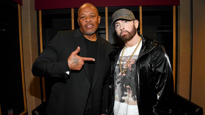 Dr. Dre and Eminem pose backstage during the 36th Annual Rock &amp; Roll Hall Of Fame Induction Ceremony