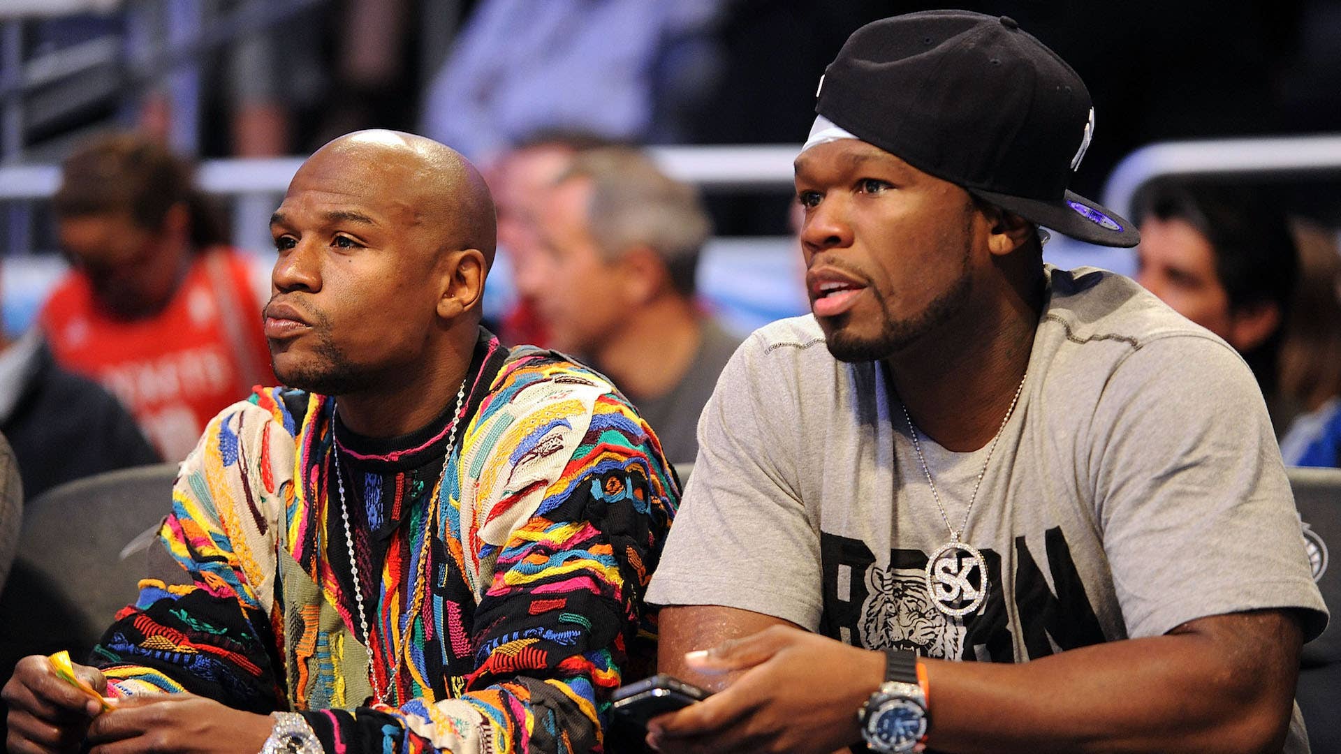 Floyd Mayweather and Rapper 50 Cent sit courtside during 2012 All Star Weekend.