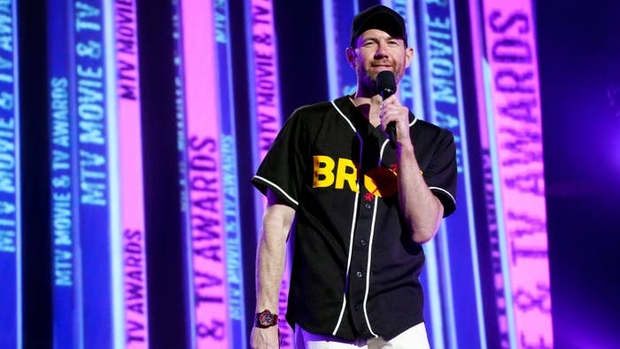 Billy Eichner is pictured speaking to a crowd