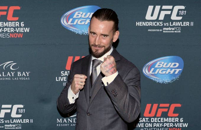 Phil 'CM Punk' Brooks poses backstage