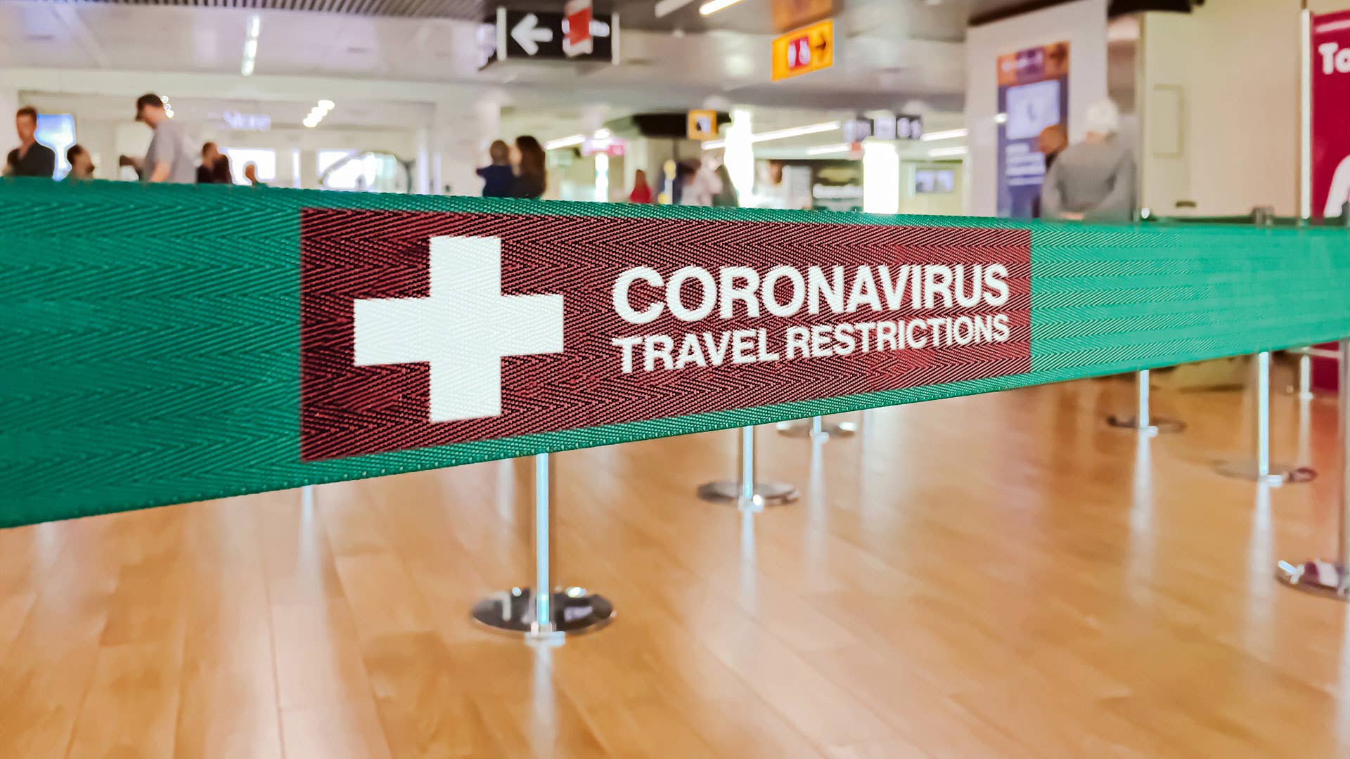 A sign advertising coronavirus travel restrictions.