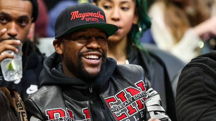 Floyd Mayweather is seen at a game between the Hawks and Bucks.