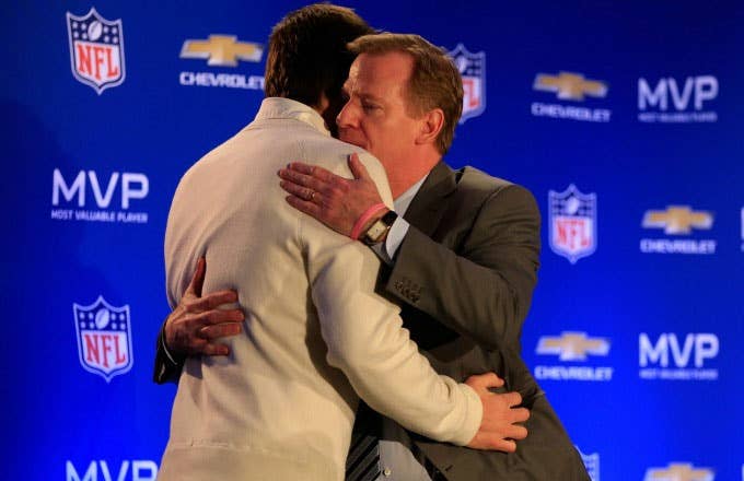 Roger Goodell and Tom Brady hug in 2015.