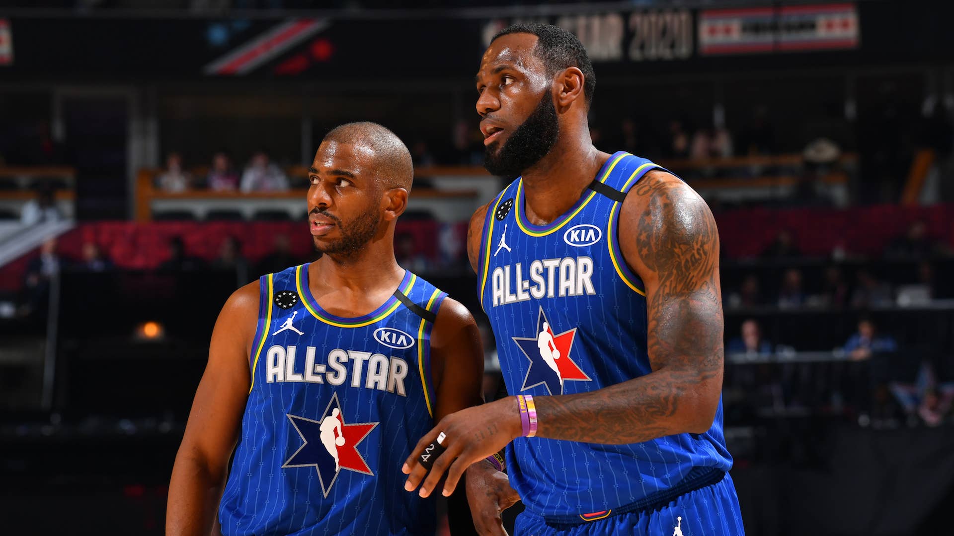 Chris Paul and LeBron James look on during the 69th NBA All Star Game.