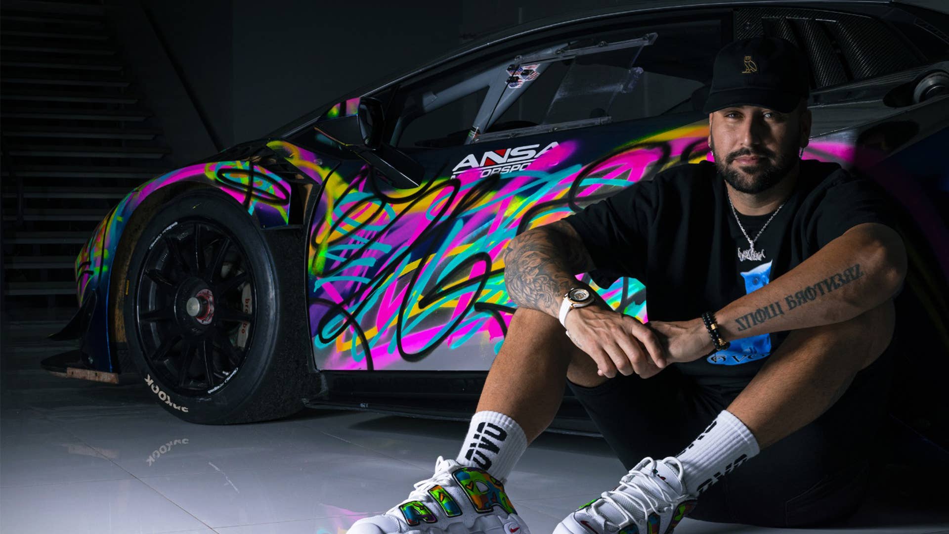 D-Snow in front of a painted lambo