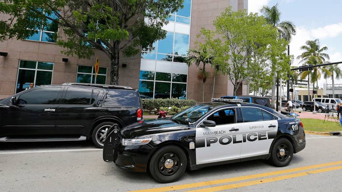 A Miami Beach police car sits outside the headquarters of CONCACAF