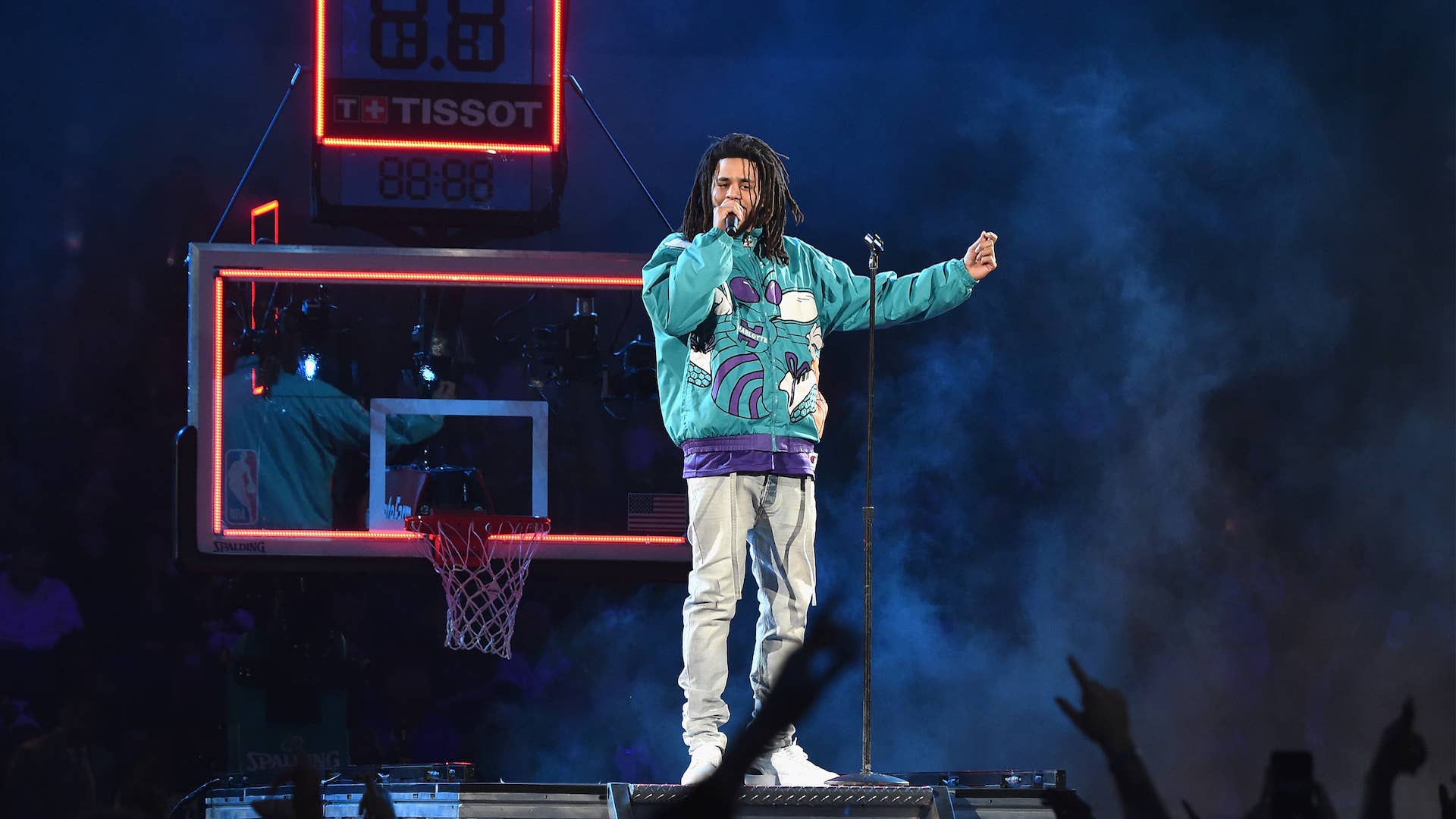 J. Cole performs at halftime during the 68th NBA All Star Game