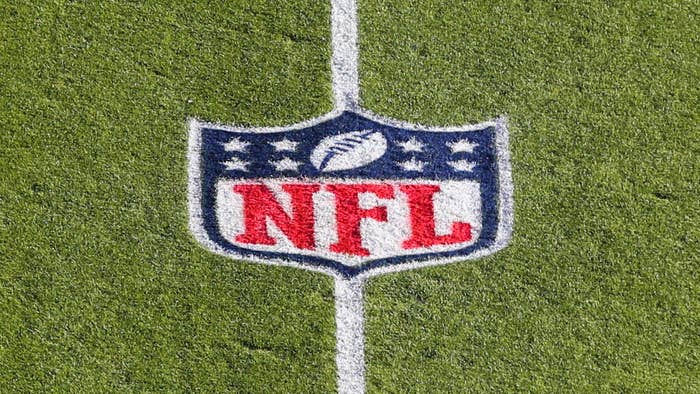 A view of the NFL logo on the field before a game