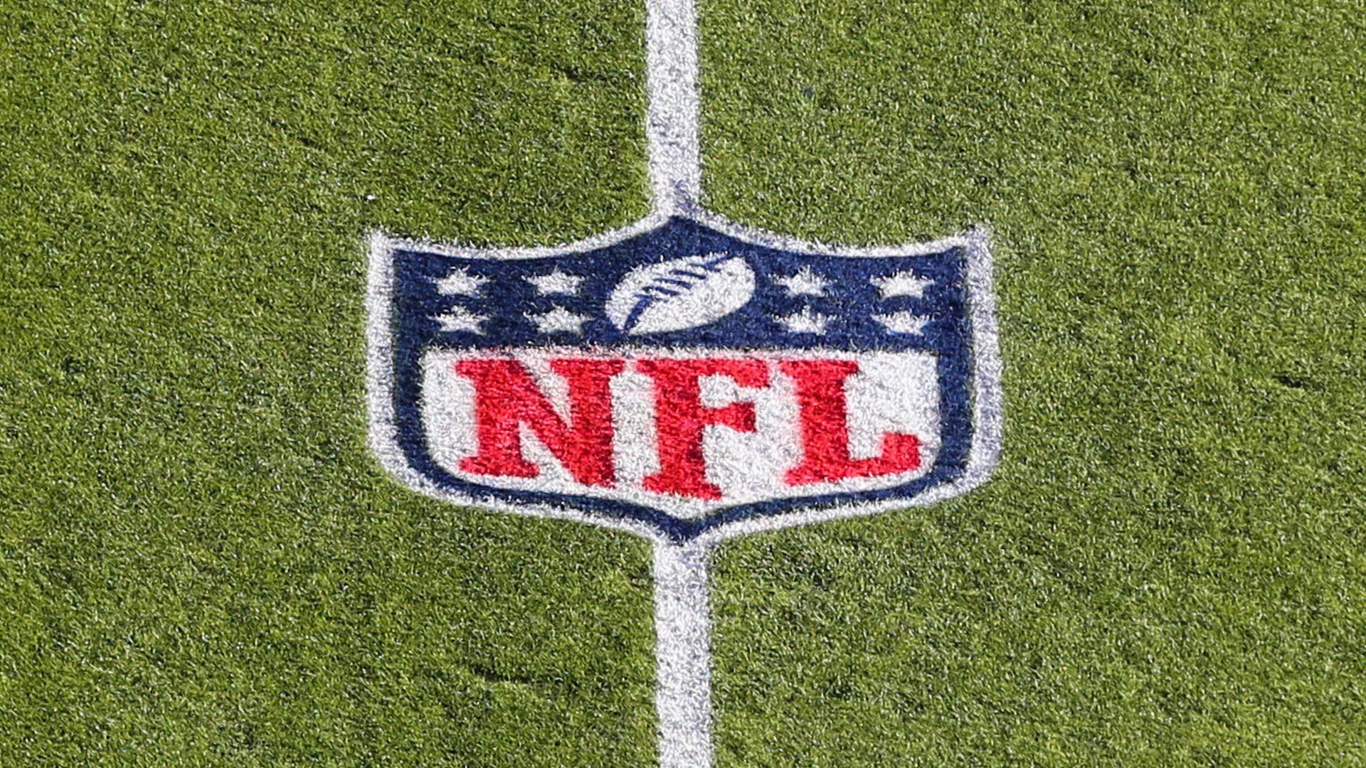 A view of the NFL logo on the field before a game