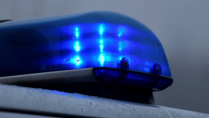 Flashing blue light of a police car in Datteln, western Germany.