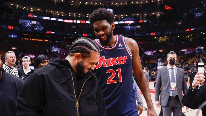 Joel Embiid of the Philadelphia 76ers greets Canadian rapper Drake