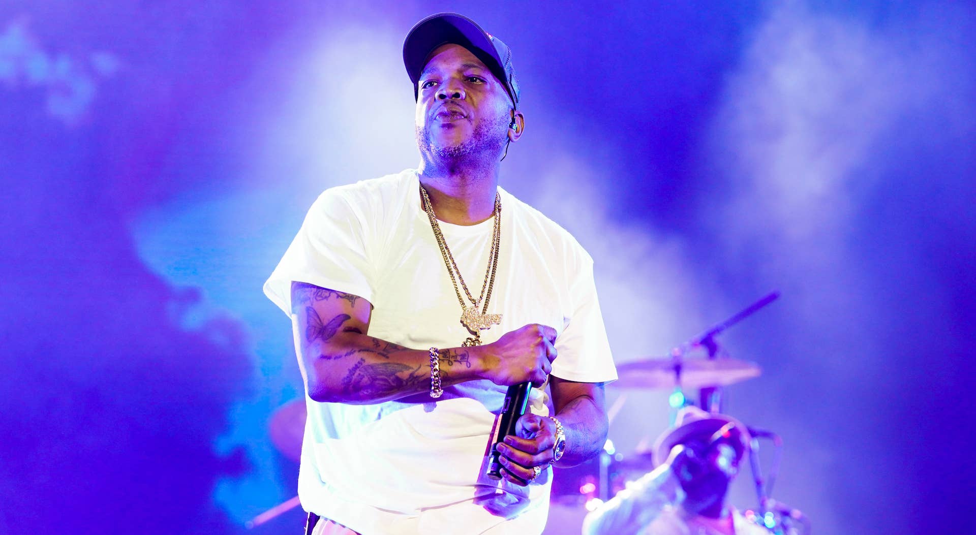 Styles P onstage holding bottle