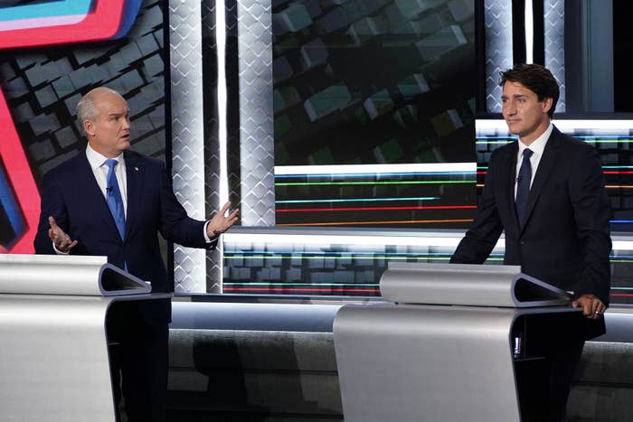 Conservative leader Erin O&#x27;Toole (L) turns to Canadian Prime Minister and Liberal leader Justin Trudeau during the federal election French-language leaders debate at the Canadian Museum of History in Gatineau, Quebec, Canada on September 8, 2021.