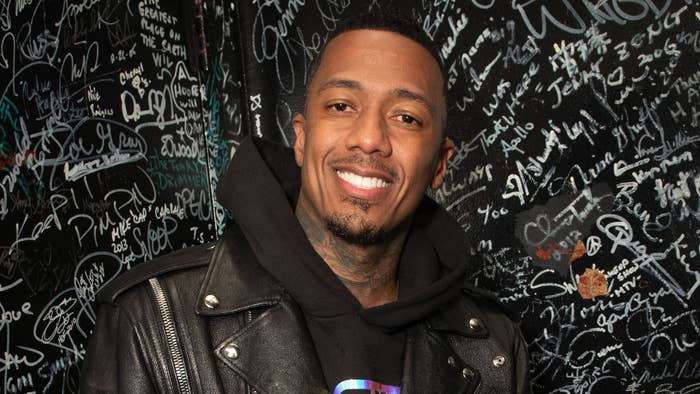 Nick Cannon is pictured posing for a photo