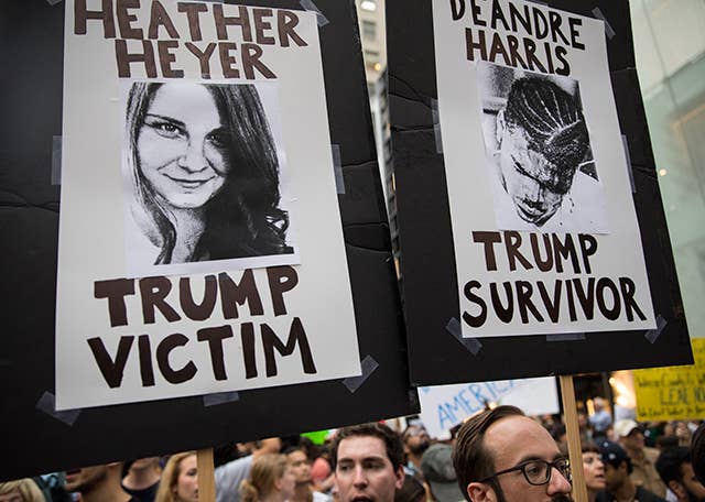 Heather Heyer and Deandre Harris posters at an anti Trump demonstration outside of Trump Tower