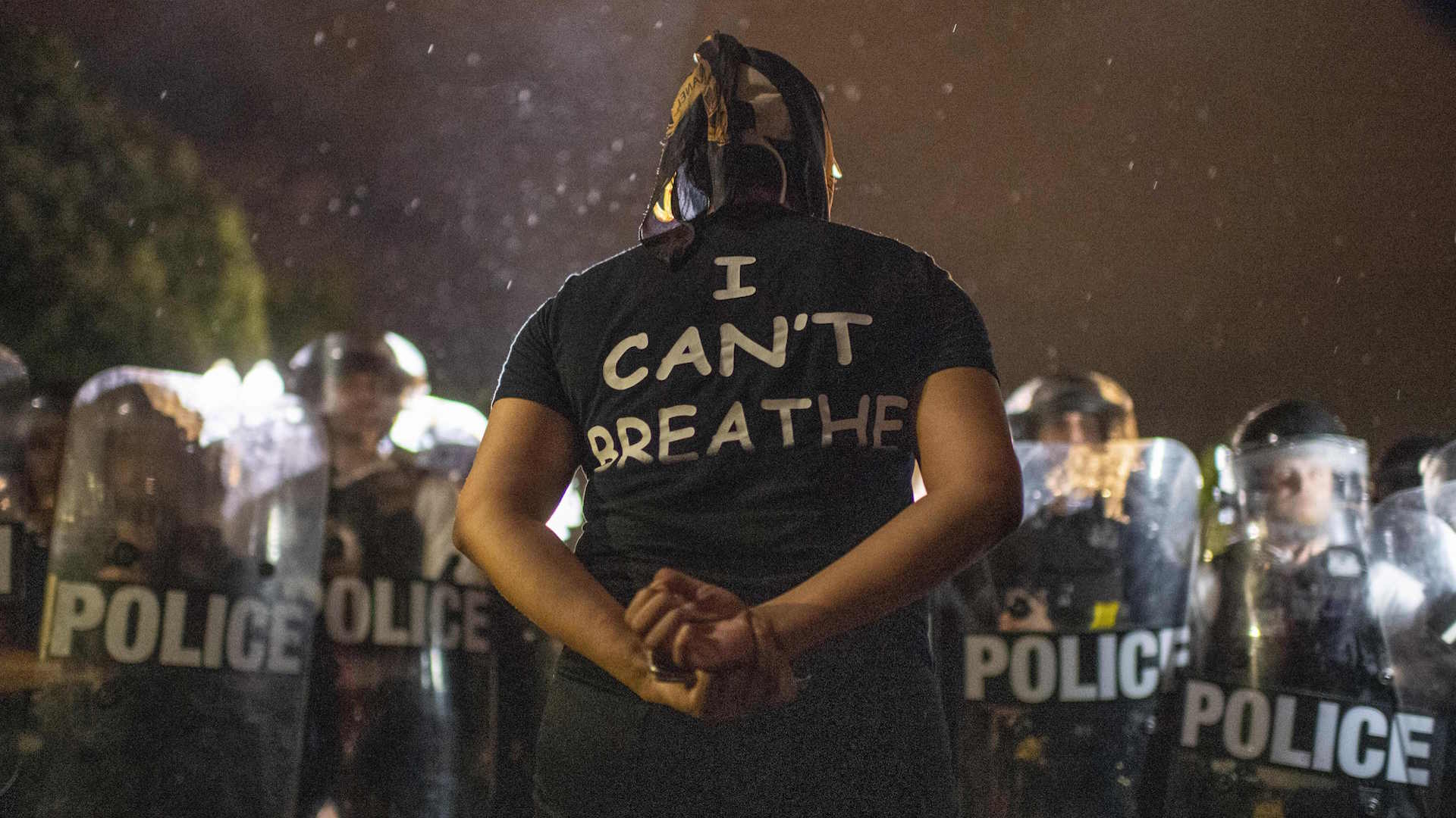 Protesters face off with police