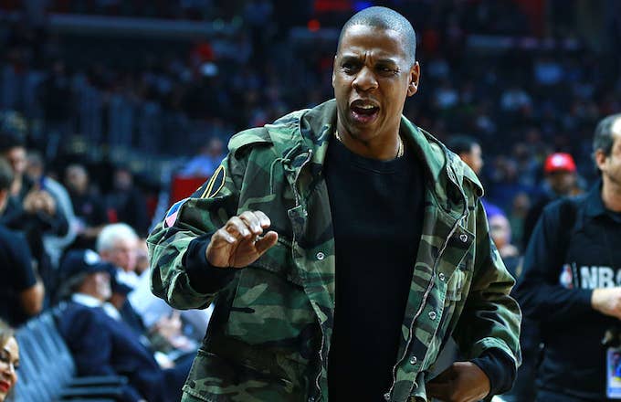 Rapper/musical artist and producer Jay Z attends the NBA game