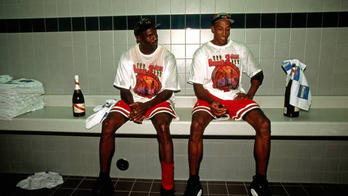 Michael Jordan and Scottie Pippen celebrate in the locker room after winning 1998 NBA Championship.