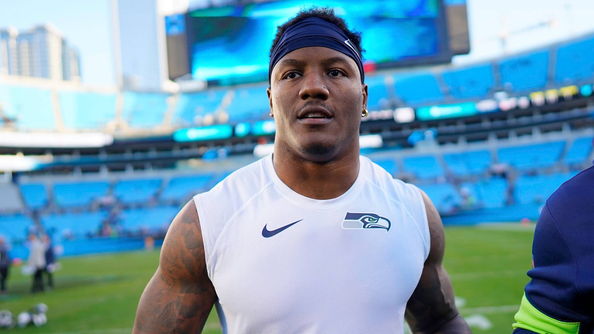 Chris Carson #32 of the Seattle Seahawks after their game against the Carolina Panthers