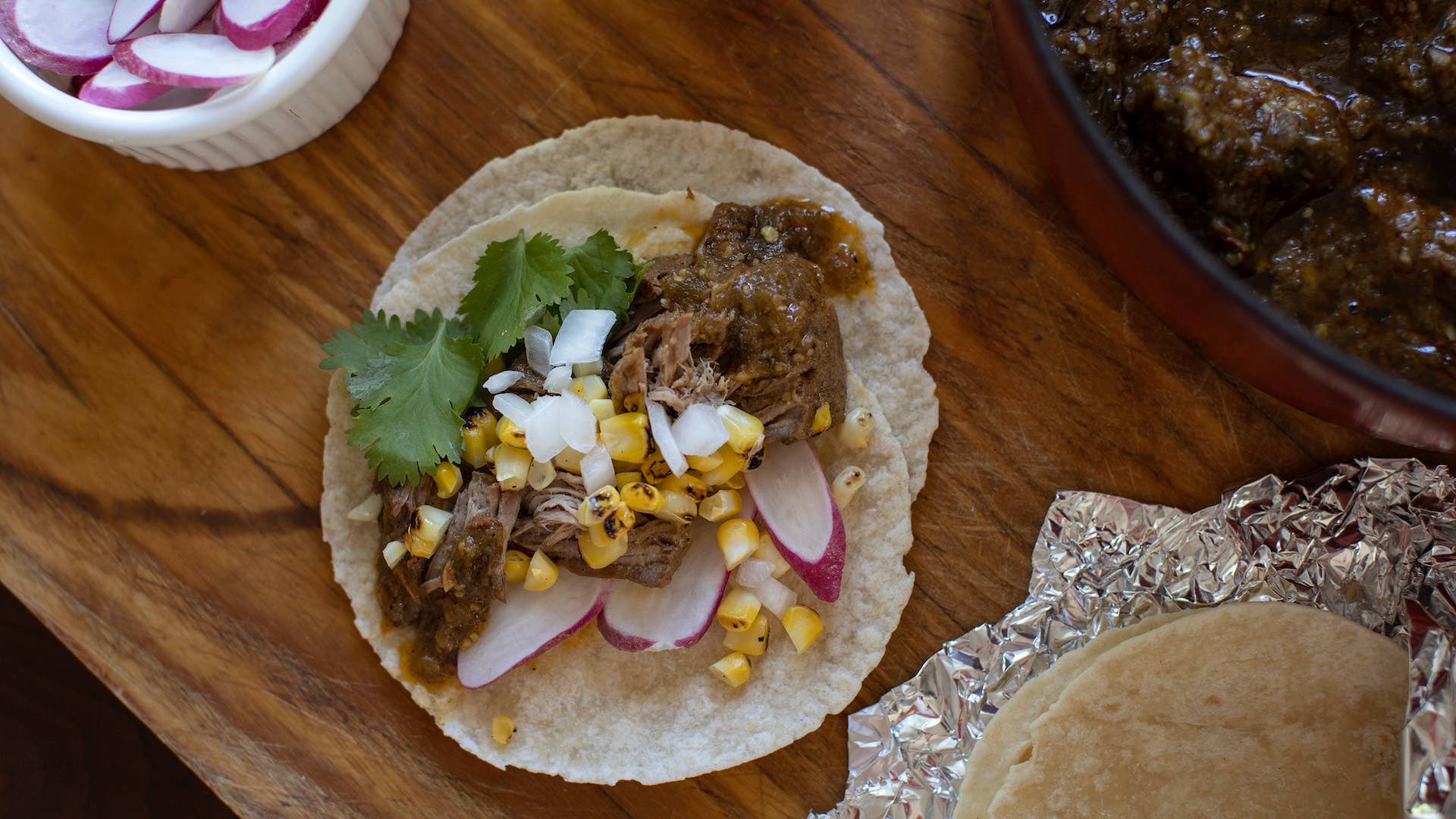 Tacos made with chile verde braised pork