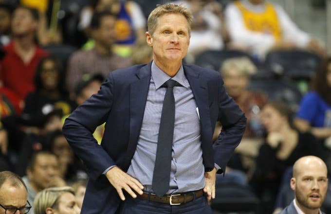 Steve Kerr reacts to a call during a Warriors game.