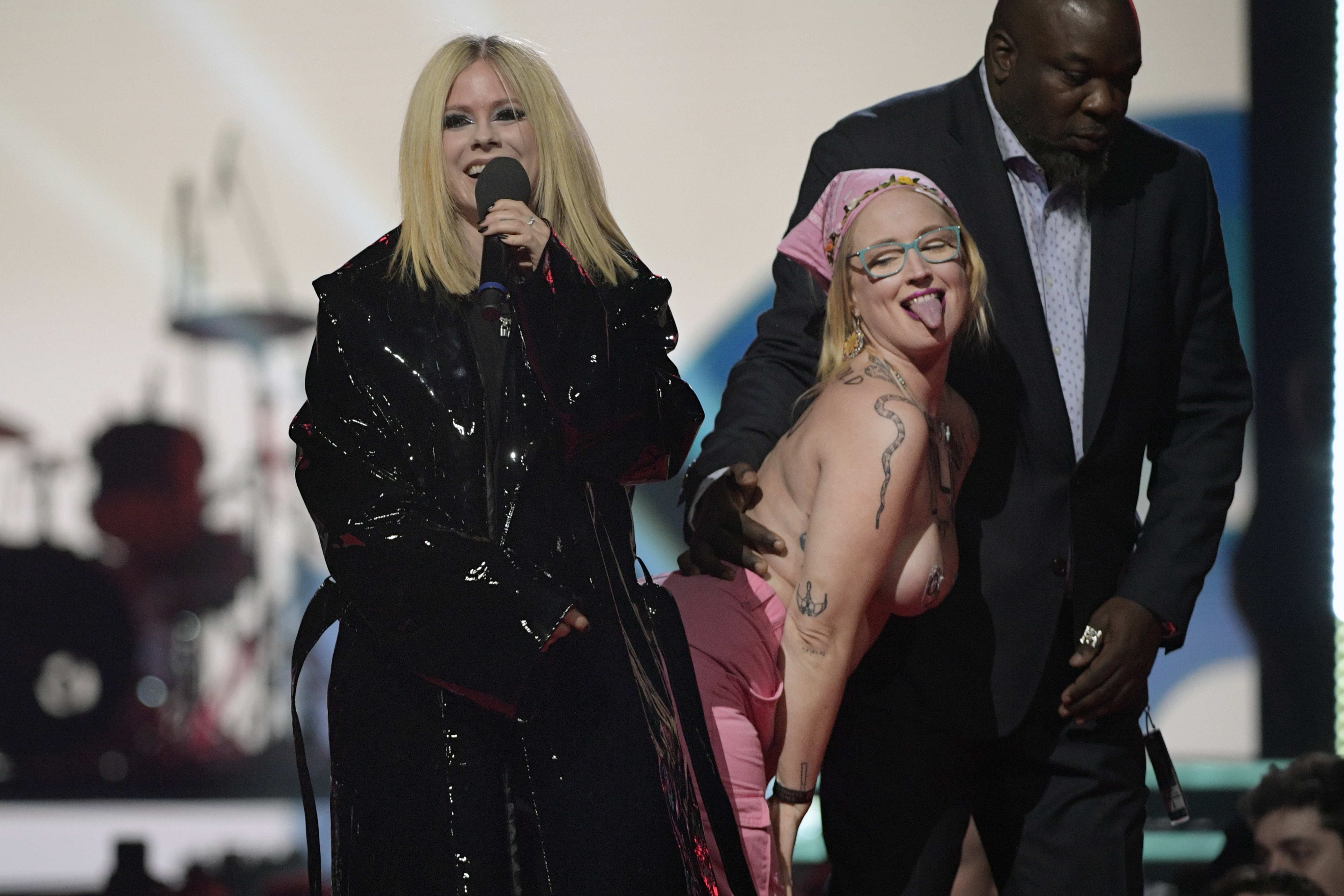 Topless Protestor Interrupts Avril Lavigne at the Juno Awards Complex