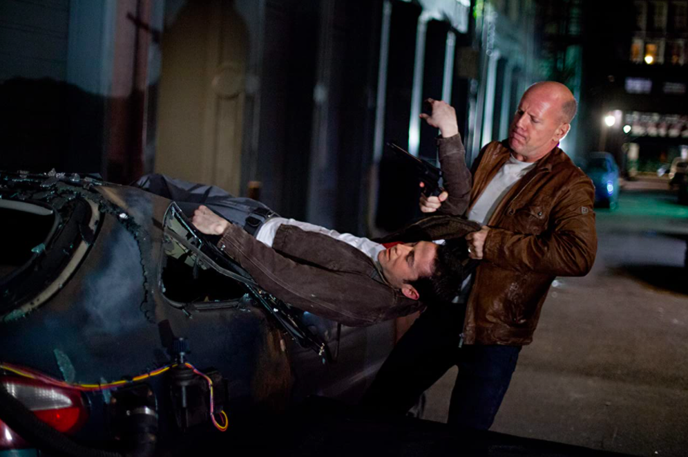 Joseph Gordon Levitt and Bruce Willis in &#x27;Looper&#x27;