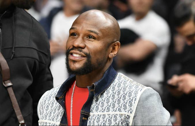 Floyd Mayweather Jr. attends a basketball game