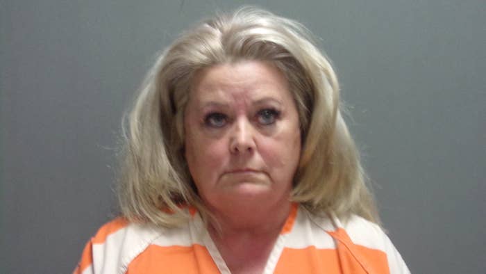 Woman Arrested and Charged With Felony spitting on corpse.