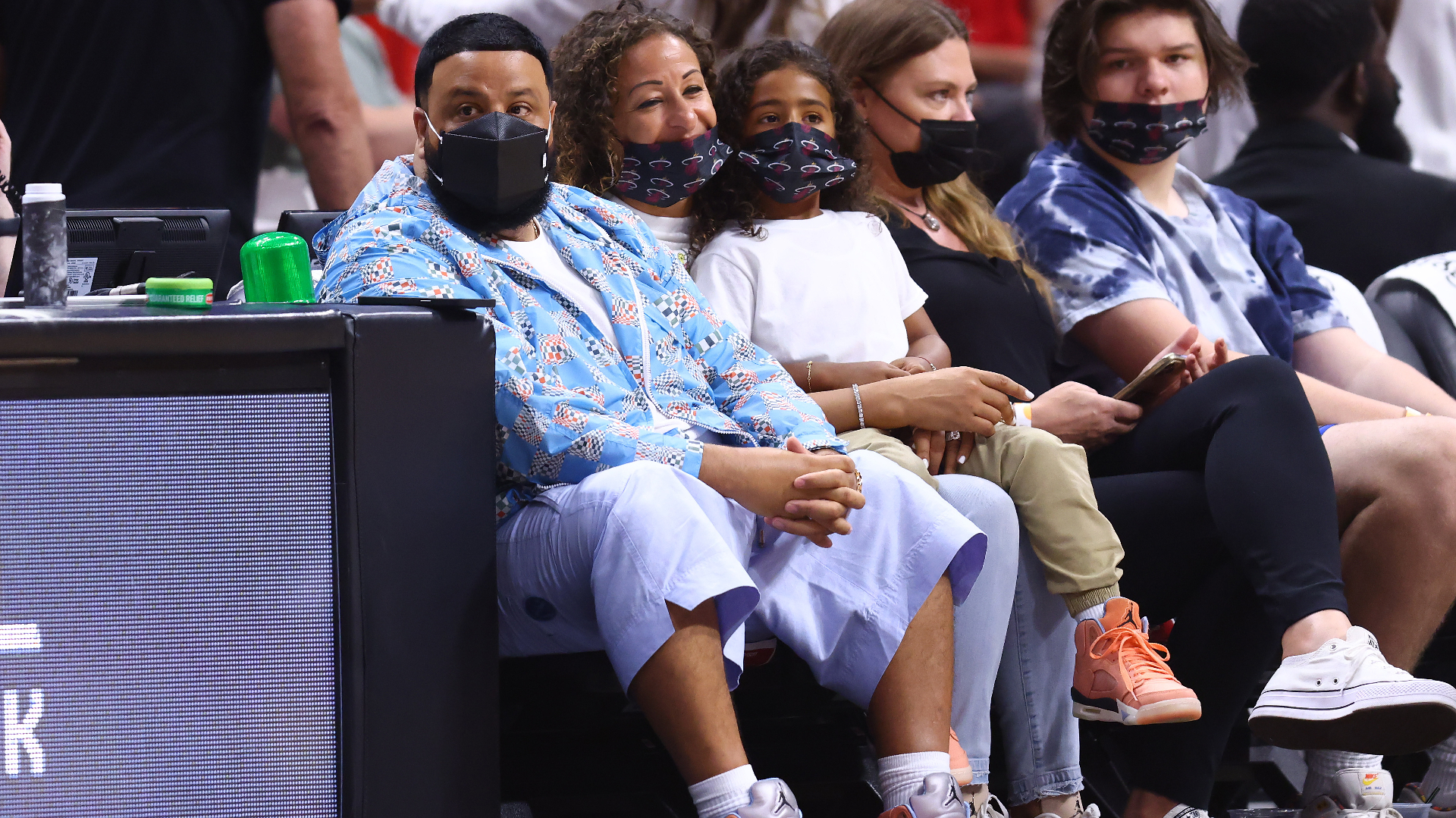 djkhaled sitting courtside with the Louis Vuitton Air Force 1 Low and  pillow on the ground 😂