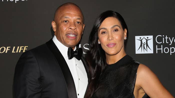 Dr. Dre (L) and his Wife Nicole Young (R) attend the City Of Hope Gala.