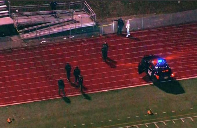 Police respond to a reported shooting at a high school football game in Pleasantville, New Jersey.