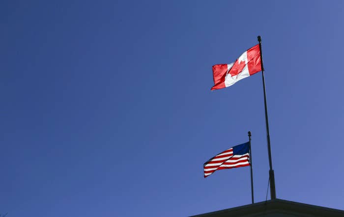 Canada American border flags