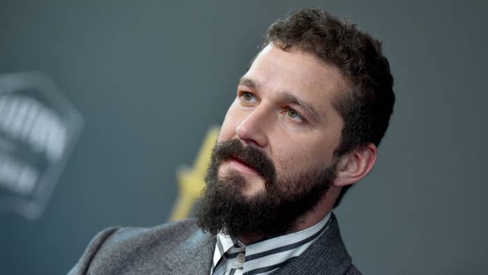 Shia LaBeouf walks a red carpet.