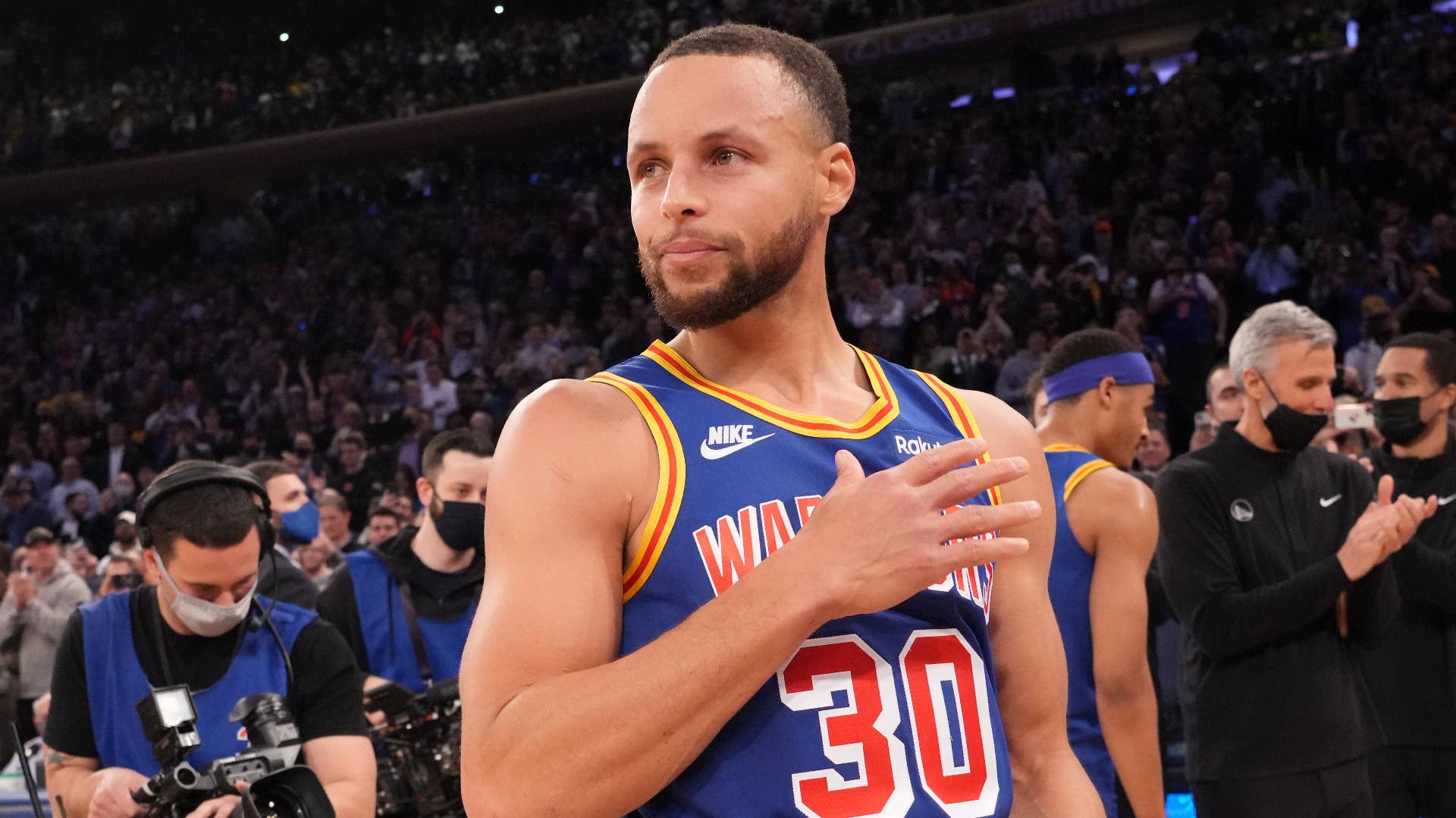 Stephen Curry celebrates setting the NBA's most three pointers made record.