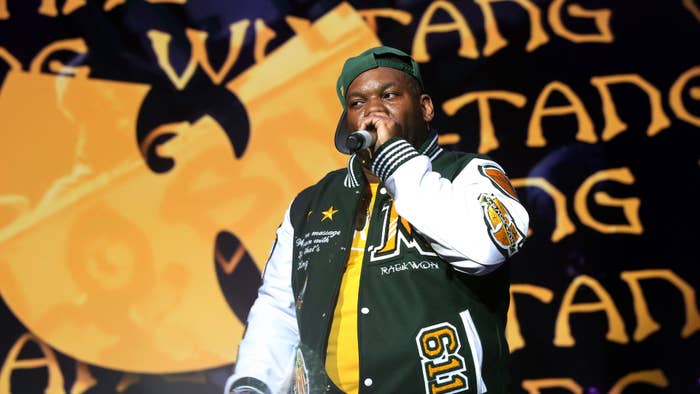 Raekwon performs in front of fans.