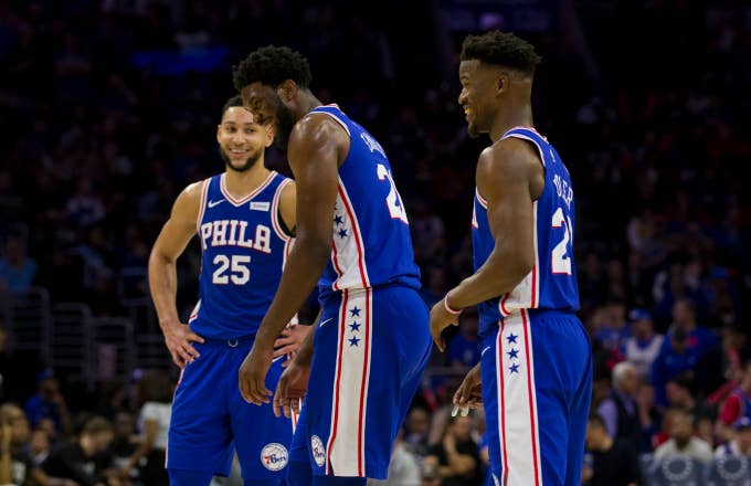 Ben Simmons #25, Joel Embiid #21 and Jimmy Butler #23 of the Philadelphia 76ers