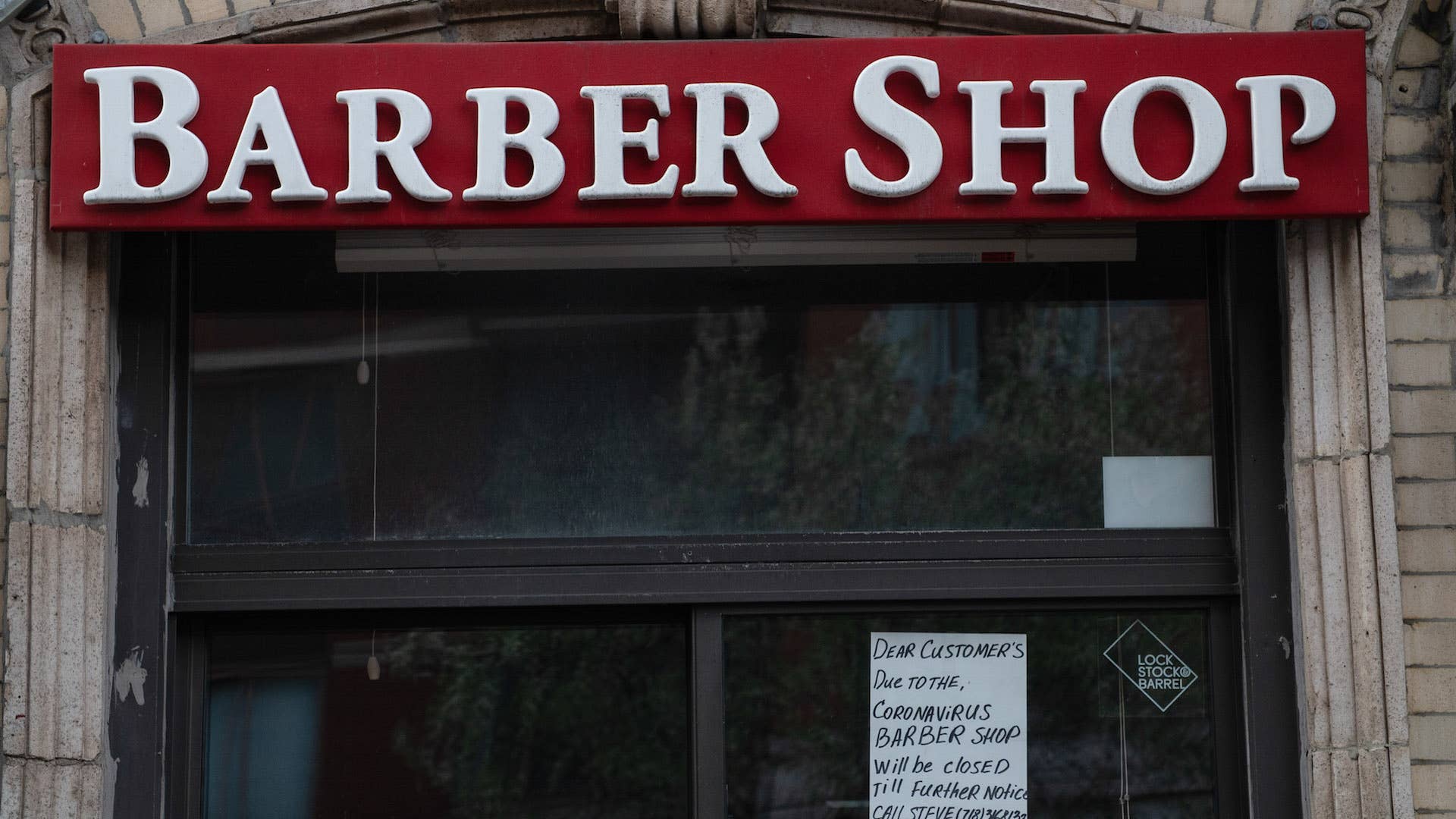 A view of a closed barbershop in Manhattan