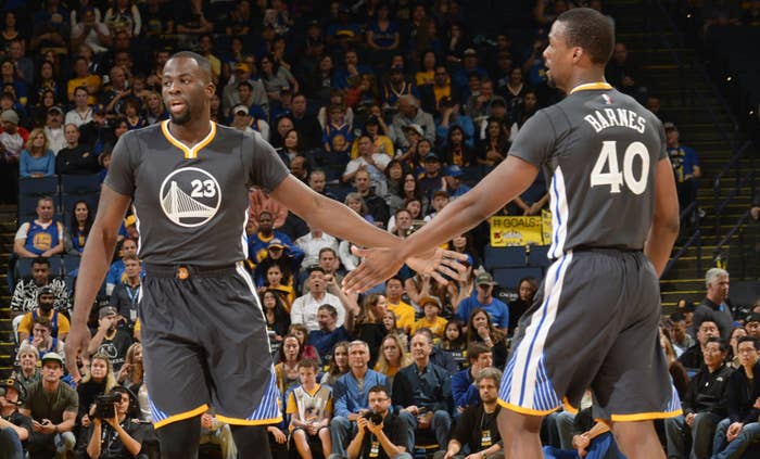 Golden State Warriors forwards Draymond Green and Harrison Barnes in 2016