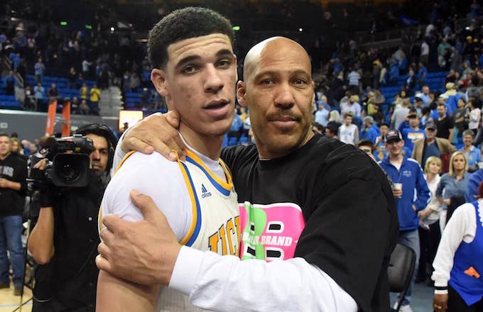 LaVar Ball hugs his son Lonzo.