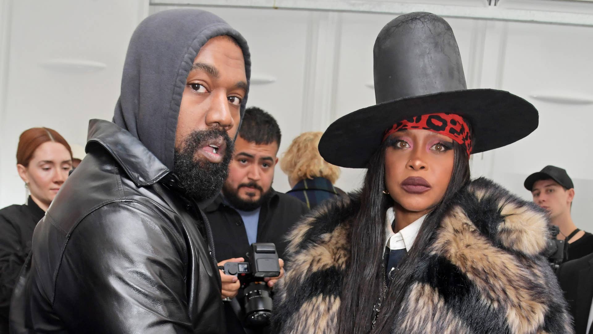 Kanye West and Erykah Badu pose backstage at the Burberry Spring/Summer 2023 runway show