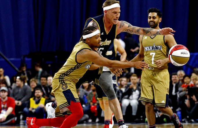 Romeo Miller battles with Jason Williams for a loose ball over All Star weekend.