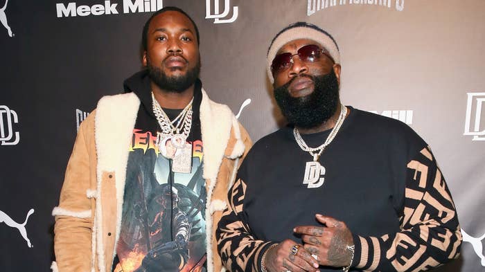Rick Ross and Meek Mill pose for a photo together.