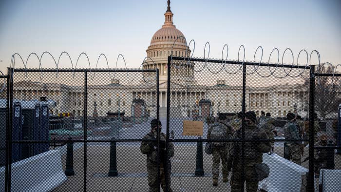 The US Capital is seen as National Guard secure the the grounds