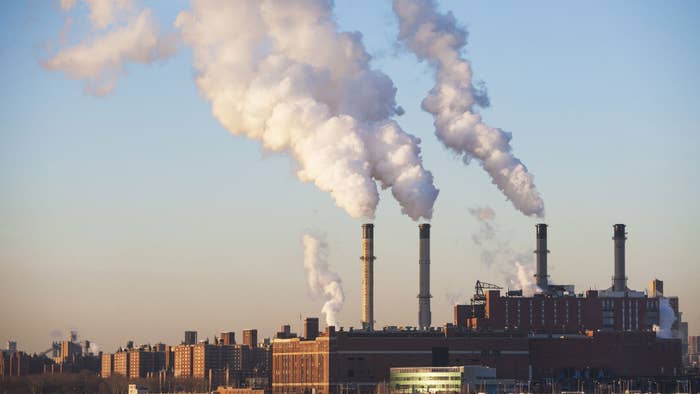 Smoke billows from an industrial plant