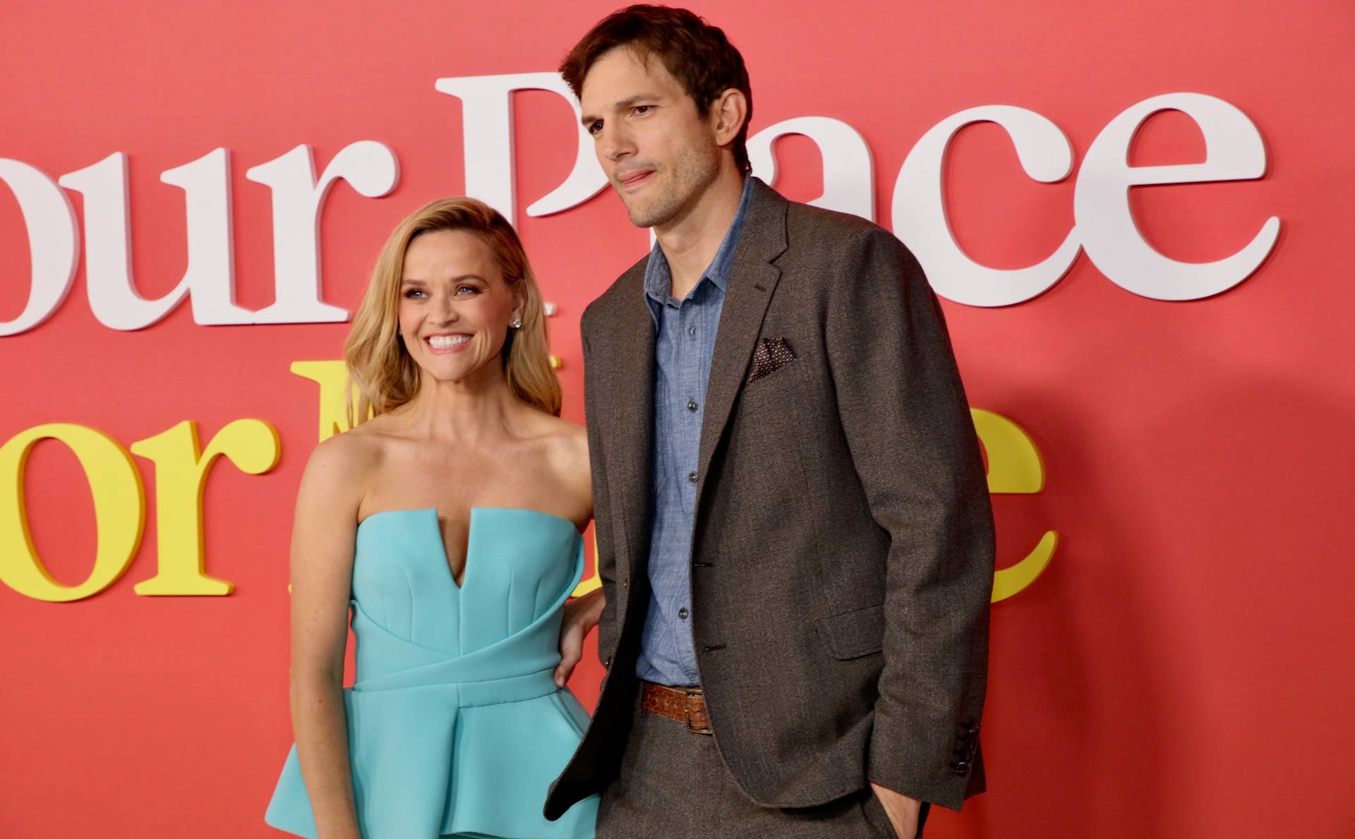 red carpet photo of kutcher and reese