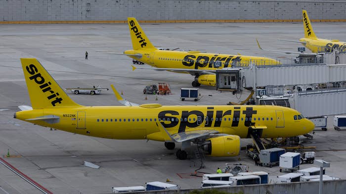 Spirit Airlines planes are prepared for flight at the Fort Lauderdale Hollywood International Airport