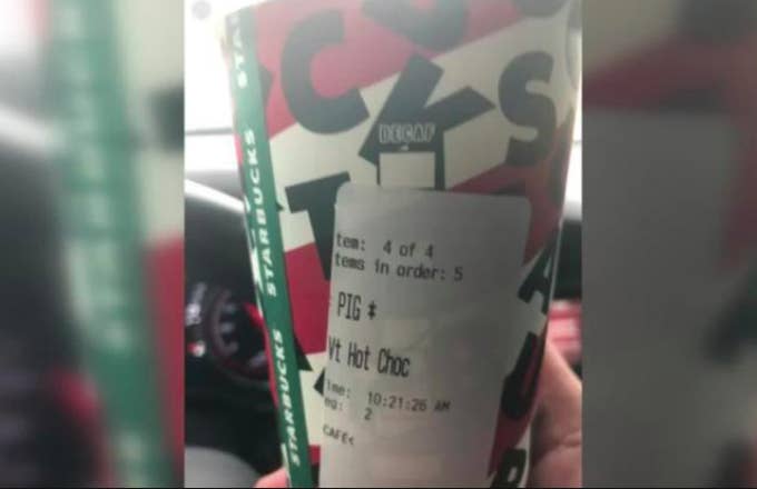 Starbucks Coffee Cup labeled 'PIG'
