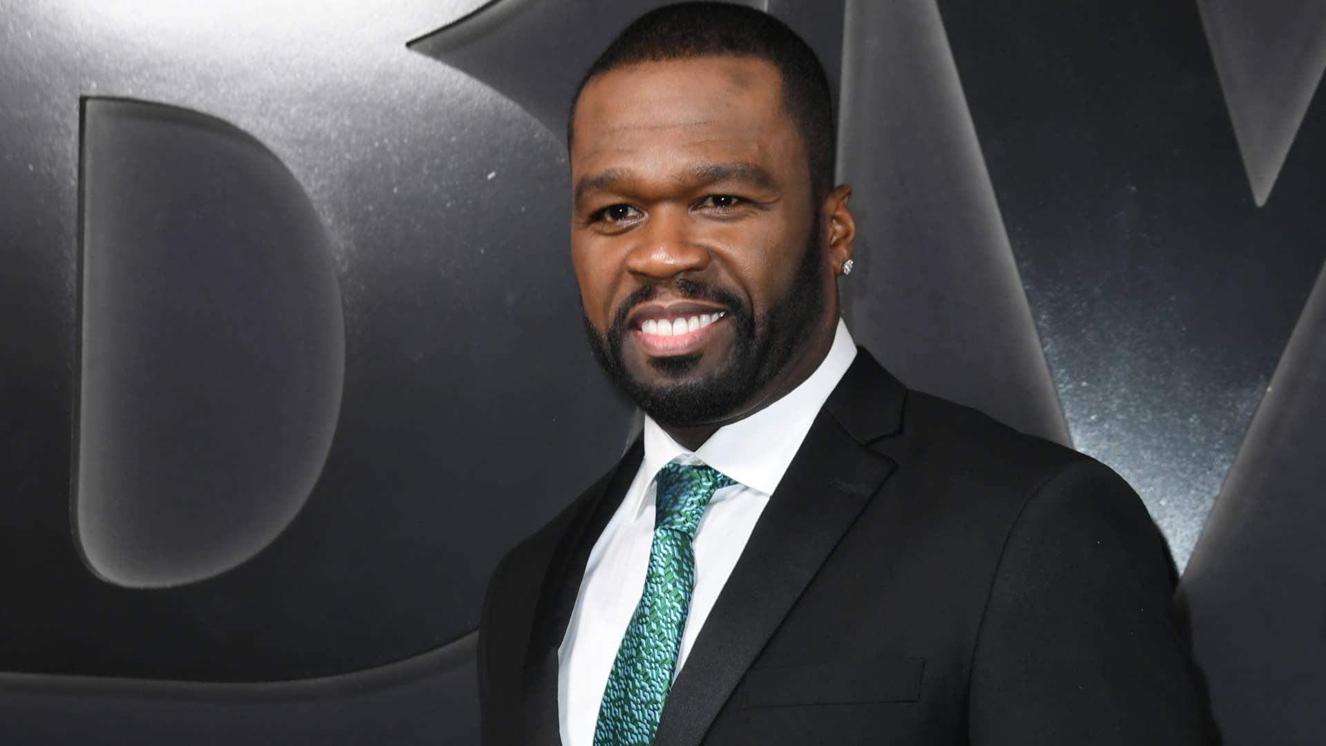 50 Cent pictured at a red carpet event