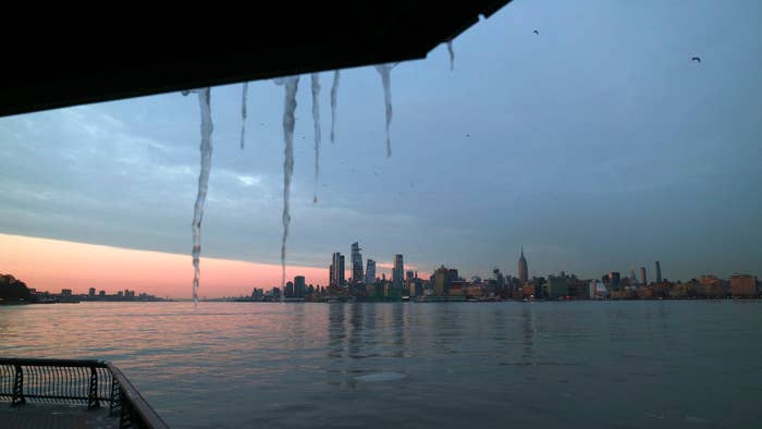 Icicles hang in front of Hudson Yards and the Empire State Building
